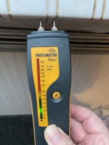 Using a damp meter to check for damp levels